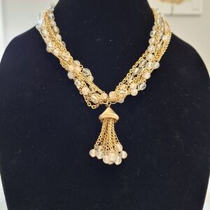 Puccini Multi Strand Goldtone Necklace With Clear And Opaque Beads And Tassle